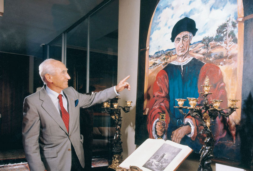 Franco in front of his portrait, in the garb of a Renaissance man, painted by Pio Carlone.