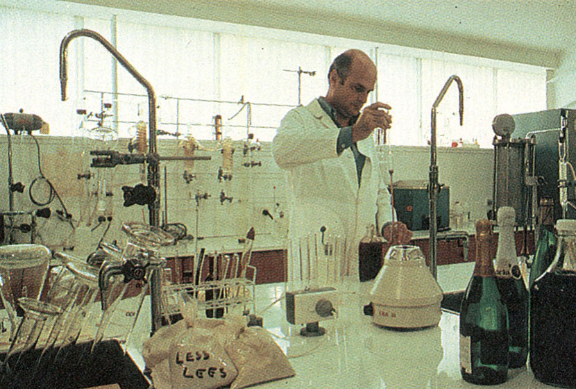 1980. Vigneron Carlo Corino at work in Montrose laboratory at Mudgee, NSW.