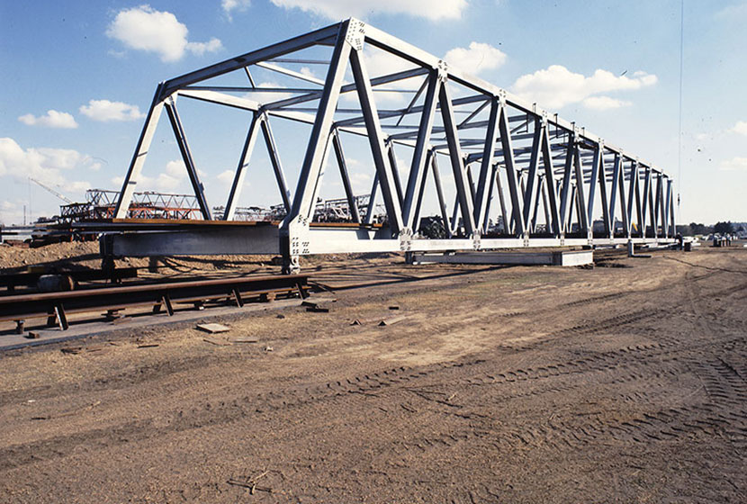 1980s. One of the Indonesian steel truss bridges being trial assembled.