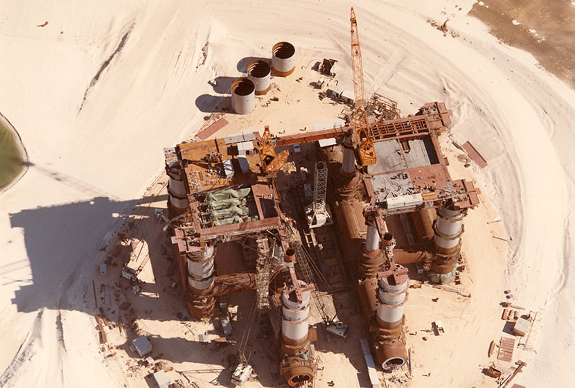 1975. Aerial view of the oil rig Ocean Endeavour being fabricated at Woodman's Point, Western Australia.