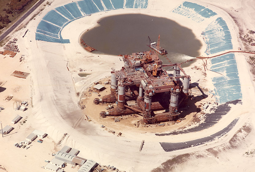1975. Aerial view of the oil rig Ocean Endeavour being fabricated at Woodman's Point, Western Australia.